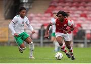 20 October 2024; Glen Ilunga of St Patrick’s Athletic in action against Jamie Nduwuba of Cork City during the EA SPORTS MU15 LOI Michael Hayes Cup match between Cork City and St Patrick’s Athletic at Turner’s Cross in Cork. Photo by Michael P Ryan/Sportsfile