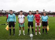 20 October 2024; Referee Bobby Jack Coonan, centre, with his officials Finn O'Sullivan and Lucy O'Sullivan with team captains Joe Miskella of Cork City, and Kian Quigley before the EA SPORTS MU15 LOI Michael Hayes Cup match between Cork City and St Patrick’s Athletic at Turner’s Cross in Cork. Photo by Michael P Ryan/Sportsfile