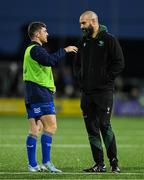 19 October 2024; Luke McGrath of Leinster, left, in conversation with Connacht defence coach Scott Fardy before the United Rugby Championship match between Connacht and Leinster at Dexcom Stadium in Galway. Photo by Brendan Moran/Sportsfile