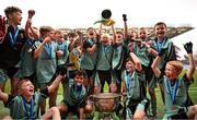 22 October 2024; St. Kilian's SNS players celebrate with the cup after the match between St. Kilian's SNS, Kingswood, Dublin, and Gaelscoil Shliabh Rua, Dublin, on day two of the Allianz Cumann na mBunscol Finals at Croke Park in Dublin. Photo by Ramsey Cardy/Sportsfile