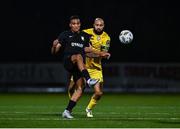 24 October 2024; Noah Van Geenen of Athlone Town in action against Ethan Boyle of Wexford during the SSE Airtricity Men's First Division Play-Off semi-final first leg match between Athlone Town and Wexford at Athlone Town Stadium in Westmeath. Photo by Tyler Miller/Sportsfile