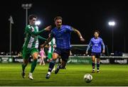 24 October 2024; Ronan Finn of UCD in action against Harry Groome of Bray Wanderers during the SSE Airtricity Men's First Division Play-Off semi-final first leg match between Bray Wanderers and UCD at Carlisle Grounds in Bray, Wicklow. Photo by Thomas Flinkow/Sportsfile