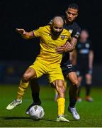 24 October 2024; Ethan Boyle of Wexford in action against Noah Van Geenen of Athlone Town during the SSE Airtricity Men's First Division Play-Off semi-final first leg match between Athlone Town and Wexford at Athlone Town Stadium in Westmeath. Photo by Tyler Miller/Sportsfile