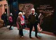 25 October 2024; Derry City supporters Mick and Teresa McBride arrive before the SSE Airtricity Men's Premier Division match between St Patrick's Athletic and Derry City at Richmond Park in Dublin. Photo by David Fitzgerald/Sportsfile