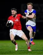 25 October 2024; Matthew Donnelly of Trillick in action against Peter Og McCartan of Errigal Ciaran during the Tyrone County Senior Club Football Championship final match between Errigal Ciarán and Trillick at O'Neills Healy Park in Omagh, Tyrone. Photo by Ramsey Cardy/Sportsfile