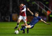 25 October 2024; Kian Leavy of St Patrick's Athletic is tackled by Ronan Boyce of Derry City during the SSE Airtricity Men's Premier Division match between St Patrick's Athletic and Derry City at Richmond Park in Dublin. Photo by David Fitzgerald/Sportsfile