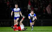 25 October 2024; Niall Kelly of Errigal Ciaran in action against Matthew Donnelly of Trillick during the Tyrone County Senior Club Football Championship final match between Errigal Ciarán and Trillick at O'Neills Healy Park in Omagh, Tyrone. Photo by Ramsey Cardy/Sportsfile
