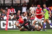 26 October 2024; Mike Haley of Munster dives over to score Munster’s second try during the United Rugby Championship match between Hollywoodbets Sharks and Munster at Hollywoodbets Kings Park in Durban, South Africa. Photo by Shaun Roy/Sportsfile