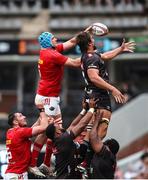 26 October 2024; Munster captain Tadhg Beirne and Hollywoodbets Sharks captain Eben Etzebeth challenge for the line out ball during the United Rugby Championship match between Hollywoodbets Sharks and Munster at Hollywoodbets Kings Park in Durban, South Africa. Photo by Shaun Roy/Sportsfile