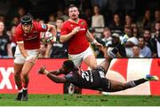 26 October 2024; Mike Haley of Munster gets past Siya Masuku of Hollywoodbets Sharks attempted tackle during the United Rugby Championship match between Hollywoodbets Sharks and Munster at Hollywoodbets Kings Park in Durban, South Africa. Photo by Shaun Roy/Sportsfile