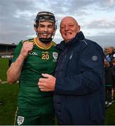 26 October 2024; Gerard Walsh of Ireland and Terence McNaughton celebrate after the Shinty International match between Ireland and Scotland at Cusack Park in Ennis, Clare. Photo by Ray McManus/Sportsfile