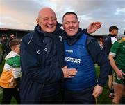 26 October 2024; Terence McNaughton, left, and Ireland manager Michael Kavanagh celebrate after the Shinty International match between Ireland and Scotland at Cusack Park in Ennis, Clare. Photo by Ray McManus/Sportsfile