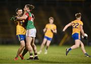 26 October 2024; Padraig O'Hora of Ballina Stephenites and Kevin McLoughlin of Knockmore tussle off the ball, as Knockmore go on the attack, during the Mayo County Senior Club Football Championship final match between Ballina Stephenites and Knockmore at Hastings Insurance MacHale Park in Castlebar, Mayo. Photo by Piaras Ó Mídheach/Sportsfile