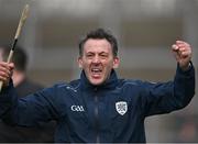 26 October 2024; Kevin O'Brien celebrates a score for Ireland, late in the game, during the Shinty International match between Ireland and Scotland at Cusack Park in Ennis, Clare. Photo by Ray McManus/Sportsfile