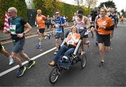 27 October 2024; Actor Colin Farrell with Emma Fogarty during the 2024 Irish Life Dublin Marathon. This marks the 43rd edition of the race with thousands of participants from international athletes, club runners, wheelchair-assisted participants, charity runners, and first-time marathon participants taking on the 26.2-mile challenge. This year’s race started on Leeson Street and finished at the Pepper Canister Church on Mount Street Upper. Photo by Ramsey Cardy/Sportsfile