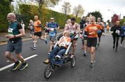 27 October 2024; Actor Colin Farrell with Emma Fogarty during the 2024 Irish Life Dublin Marathon. This marks the 43rd edition of the race with thousands of participants from international athletes, club runners, wheelchair-assisted participants, charity runners, and first-time marathon participants taking on the 26.2-mile challenge. This year’s race started on Leeson Street and finished at the Pepper Canister Church on Mount Street Upper. Photo by Ramsey Cardy/Sportsfile