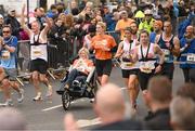 27 October 2024; Actor Colin Farrell with Emma Fogarty during the 2024 Irish Life Dublin Marathon. This marks the 43rd edition of the race with thousands of participants from international athletes, club runners, wheelchair-assisted participants, charity runners, and first-time marathon participants taking on the 26.2-mile challenge. This year’s race started on Leeson Street and finished at the Pepper Canister Church on Mount Street Upper. Photo by Ramsey Cardy/Sportsfile