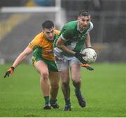 27 October 2024; Tomas Clarke of Moycullen in action against Brian Cogger of Corofin during the Galway County Senior Club Football Championship final match between Moycullen and Corofin at Tuam Stadium in Galway. Photo by Ray Ryan/Sportsfile