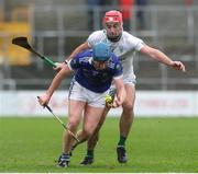 27 October 2024; John Donnelly of Thomastown in action against Fionán Mackessy of O’Loughlin Gaels during the Kilkenny County Senior Club Hurling Championship final match between O’Loughlin Gaels and Thomastown at UPMC Nowlan Park in Kilkenny. Photo by Michael P Ryan/Sportsfile