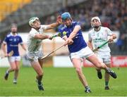 27 October 2024; John Donnelly of Thomastown in action against Paddy Deegan of O’Loughlin Gaels during the Kilkenny County Senior Club Hurling Championship final match between O’Loughlin Gaels and Thomastown at UPMC Nowlan Park in Kilkenny. Photo by Michael P Ryan/Sportsfile