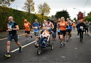 27 October 2024; Actor Colin Farrell with Emma Fogarty during the 2024 Irish Life Dublin Marathon. This marks the 43rd edition of the race with thousands of participants from international athletes, club runners, wheelchair-assisted participants, charity runners, and first-time marathon participants taking on the 26.2-mile challenge. This year’s race started on Leeson Street and finished at the Pepper Canister Church on Mount Street Upper. Photo by Ramsey Cardy/Sportsfile