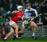 27 October 2024; Daithi Dempsey of Na Piarsaigh is tackled by Cian O'Donovan of Doon , on his way to score his side's second goal, during the Limerick County Senior Club Hurling Championship final match between Na Piarsaigh and Doon at TUS Gaelic Grounds in Limerick. Photo by Ray McManus/Sportsfile