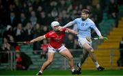 27 October 2024; Daithi Dempsey of Na Piarsaigh is tackled by Cian O'Donovan of Doon , on his way to score his side's second goal, during the Limerick County Senior Club Hurling Championship final match between Na Piarsaigh and Doon at TUS Gaelic Grounds in Limerick. Photo by Ray McManus/Sportsfile