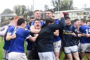 27 October 2024; The Scotstown team celebrates after winning The Mick Duffy cup during the Monaghan County Senior Club Football Championship final match between Clontibret O'Neills and Scotstown at St Tiernach's Park in Clones, Monaghan. Photo by Philip Fitzpatrick/Sportsfile