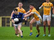 27 October 2024; Darragh Murray of Scotstowvn in action against Dessie Mone of Clontibret during the Monaghan County Senior Club Football Championship final match between Clontibret O'Neills and Scotstown at St Tiernach's Park in Clones, Monaghan. Photo by Philip Fitzpatrick/Sportsfile