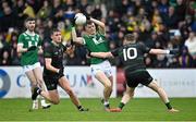 27 October 2024; Patrick McMullan of Newbridge in action against Conor Convery of Glen during the Derry County Senior Club Football Championship final match between Glen and Newbridge at Celtic Park in Derry. Photo by Oliver McVeigh/Sportsfile