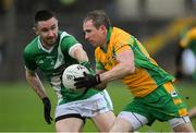 27 October 2024; Gary Sice of Corofin in action against Eoghan Kelly of Moycullen during the Galway County Senior Club Football Championship final match between Moycullen and Corofin at Tuam Stadium in Galway. Photo by Ray Ryan/Sportsfille