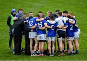 27 October 2024; The Scotstown players in a huddle before the Monaghan County Senior Club Football Championship final match between Clontibret O'Neills and Scotstown at St Tiernach's Park in Clones, Monaghan. Photo by Philip Fitzpatrick/Sportsfile