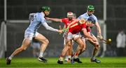 27 October 2024; Chris Thomas of Doon is tackled by William O'Donoghue, left, and Mike Foley of Na Piarsaigh during the Limerick County Senior Club Hurling Championship final match between Na Piarsaigh and Doon at TUS Gaelic Grounds in Limerick. Photo by Ray McManus/Sportsfile