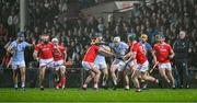 27 October 2024; JJ Carey of Na Piarsaigh is tackled by Darragh O'Donovan and Chris Thomas of Doon during the Limerick County Senior Club Hurling Championship final match between Na Piarsaigh and Doon at TUS Gaelic Grounds in Limerick. Photo by Ray McManus/Sportsfile
