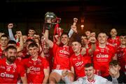 27 October 2024; Darragh O'Donovan of Doon lifts the John Daly Cup and celebrates with teammates after the Limerick County Senior Club Hurling Championship final match between Na Piarsaigh and Doon at TUS Gaelic Grounds in Limerick. Photo by Ray McManus/Sportsfile