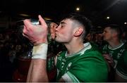 27 October 2024; Newbridge captain Conor McAteer kisses the cup after his side's victory in  the Derry County Senior Club Football Championship final match between Glen and Newbridge at Celtic Park in Derry. Photo by Oliver McVeigh/Sportsfile