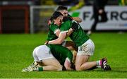 27 October 2024; Mark McGrogan, Conor McGrogan and Conleith McGrogan of Newbridge celebrate after the final whistle in the Derry County Senior Club Football Championship final match between Glen and Newbridge at Celtic Park in Derry. Photo by Oliver McVeigh/Sportsfile