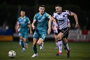 27 October 2024; Hayden Cann of Dundalk in action against Johnny Kenny of Shamrock Rovers during the SSE Airtricity Men's Premier Division match between Dundalk and Shamrock Rovers at Oriel Park in Dundalk, Louth. Photo by Ben McShane/Sportsfile