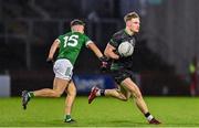 27 October 2024; Ethan Doherty of Glen in action against Óisin Doherty of Newbridge during the Derry County Senior Club Football Championship final match between Glen and Newbridge at Celtic Park in Derry. Photo by Oliver McVeigh/Sportsfile