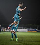 27 October 2024; Dylan Watts of Shamrock Rovers celebrates with teammate Aaron McEneff, right, after scoring their side's first goal during the SSE Airtricity Men's Premier Division match between Dundalk and Shamrock Rovers at Oriel Park in Dundalk, Louth. Photo by Ben McShane/Sportsfile