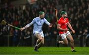 27 October 2024; Chris Thomas of Doon is tackled by William O'Donoghue of Na Piarsaigh during the Limerick County Senior Club Hurling Championship final match between Na Piarsaigh and Doon at TUS Gaelic Grounds in Limerick. Photo by Ray McManus/Sportsfile