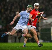 27 October 2024; Cian O'Donovan of Doon is tackled by Mike Foley of Na Piarsaigh during the Limerick County Senior Club Hurling Championship final match between Na Piarsaigh and Doon at TUS Gaelic Grounds in Limerick. Photo by Ray McManus/Sportsfile