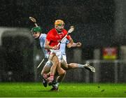 27 October 2024; Adam English of Doon is tackled by William O'Donoghue of Na Piarsaigh during the Limerick County Senior Club Hurling Championship final match between Na Piarsaigh and Doon at TUS Gaelic Grounds in Limerick. Photo by Ray McManus/Sportsfile
