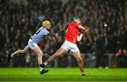27 October 2024; Chris Thomas of Doon is tackled by JJ Carey of Na Piarsaigh during the Limerick County Senior Club Hurling Championship final match between Na Piarsaigh and Doon at TUS Gaelic Grounds in Limerick. Photo by Ray McManus/Sportsfile
