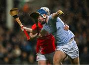 27 October 2024; Jerome Boylan of Na Piarsaigh is tackled by Pat Ryan of Doon during the Limerick County Senior Club Hurling Championship final match between Na Piarsaigh and Doon at TUS Gaelic Grounds in Limerick. Photo by Ray McManus/Sportsfile