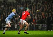 27 October 2024; Chris Thomas of Doon is tackled by JJ Carey of Na Piarsaigh during the Limerick County Senior Club Hurling Championship final match between Na Piarsaigh and Doon at TUS Gaelic Grounds in Limerick. Photo by Ray McManus/Sportsfile