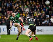 27 October 2024; Odhran McGlone of Newbridge in action against Conor Convery of Glen during the Derry County Senior Club Football Championship final match between Glen and Newbridge at Celtic Park in Derry. Photo by Oliver McVeigh/Sportsfile