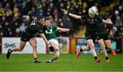 27 October 2024; Patrick McMullan of Newbridge in action against Conor Convery of Glen during the Derry County Senior Club Football Championship final match between Glen and Newbridge at Celtic Park in Derry. Photo by Oliver McVeigh/Sportsfile