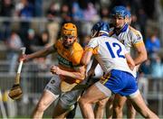 28 October 2024; Oisín Donnellan of Feakle is tackled by Shane Golden of Sixmilebridge during the Clare County Senior Club Hurling Championship final match between Sixmilebridge and Feakle at Cusack Park in Clare. Photo by Ray McManus/Sportsfile