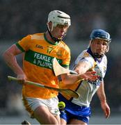 28 October 2024; Steven Conway of Feakle is tackled by Noel Purcell of Sixmilebridge during the Clare County Senior Club Hurling Championship final match between Sixmilebridge and Feakle at Cusack Park in Clare. Photo by Ray McManus/Sportsfile